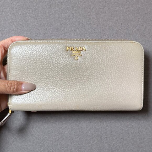Prada Handbags - Authentic Prada Taupe Pebbled Leather Zip Around Wallet